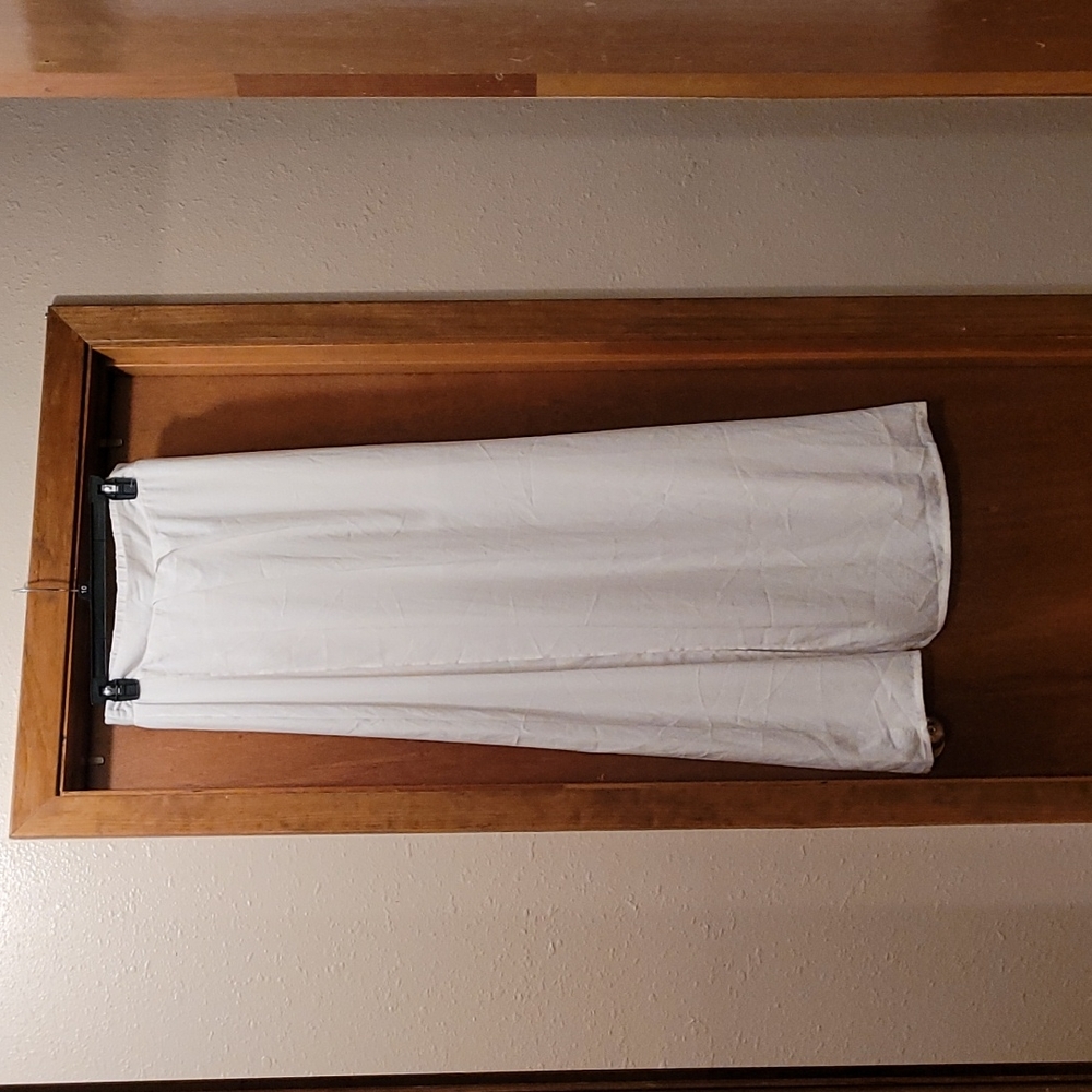 Women's size M skirt, off white color, slit in front on right side